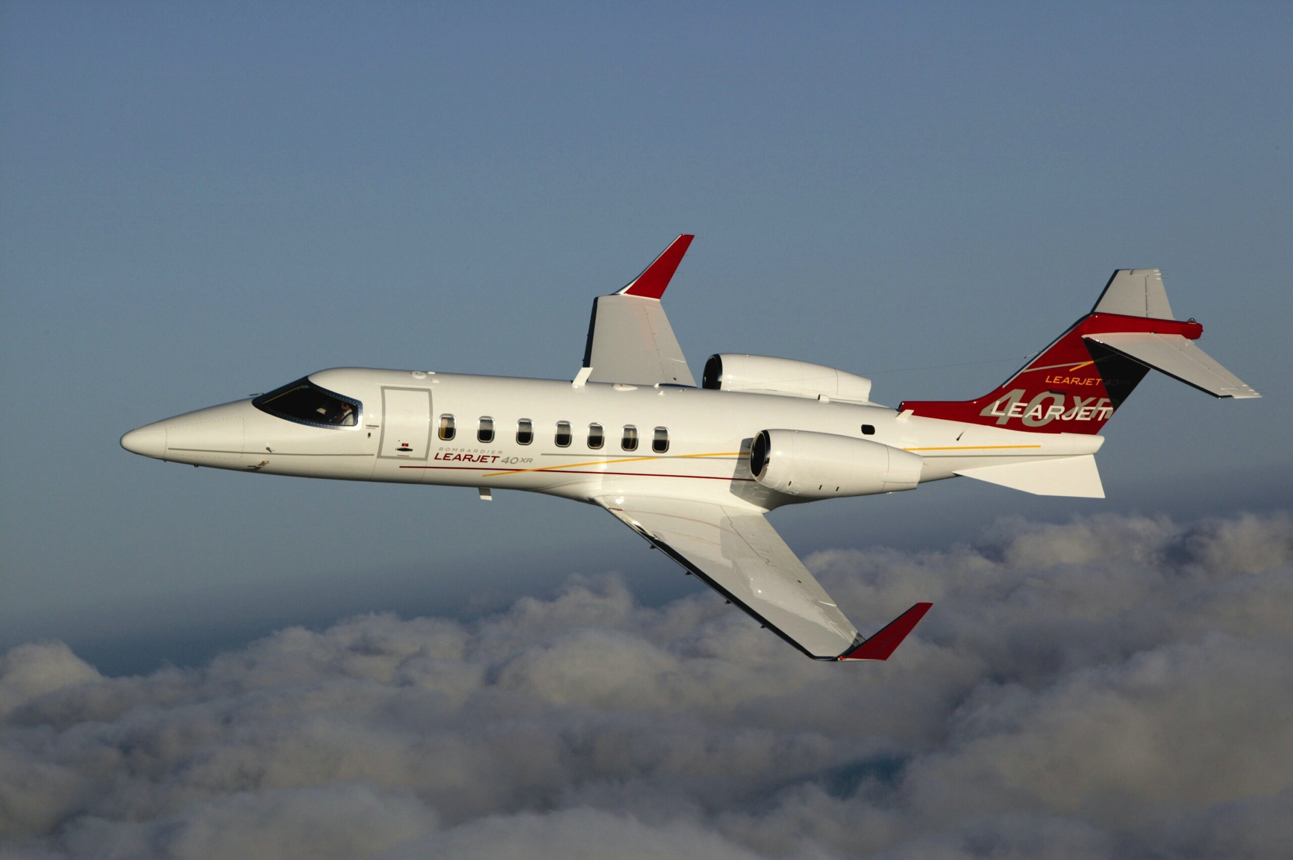 LearJet 40XR flying clouds