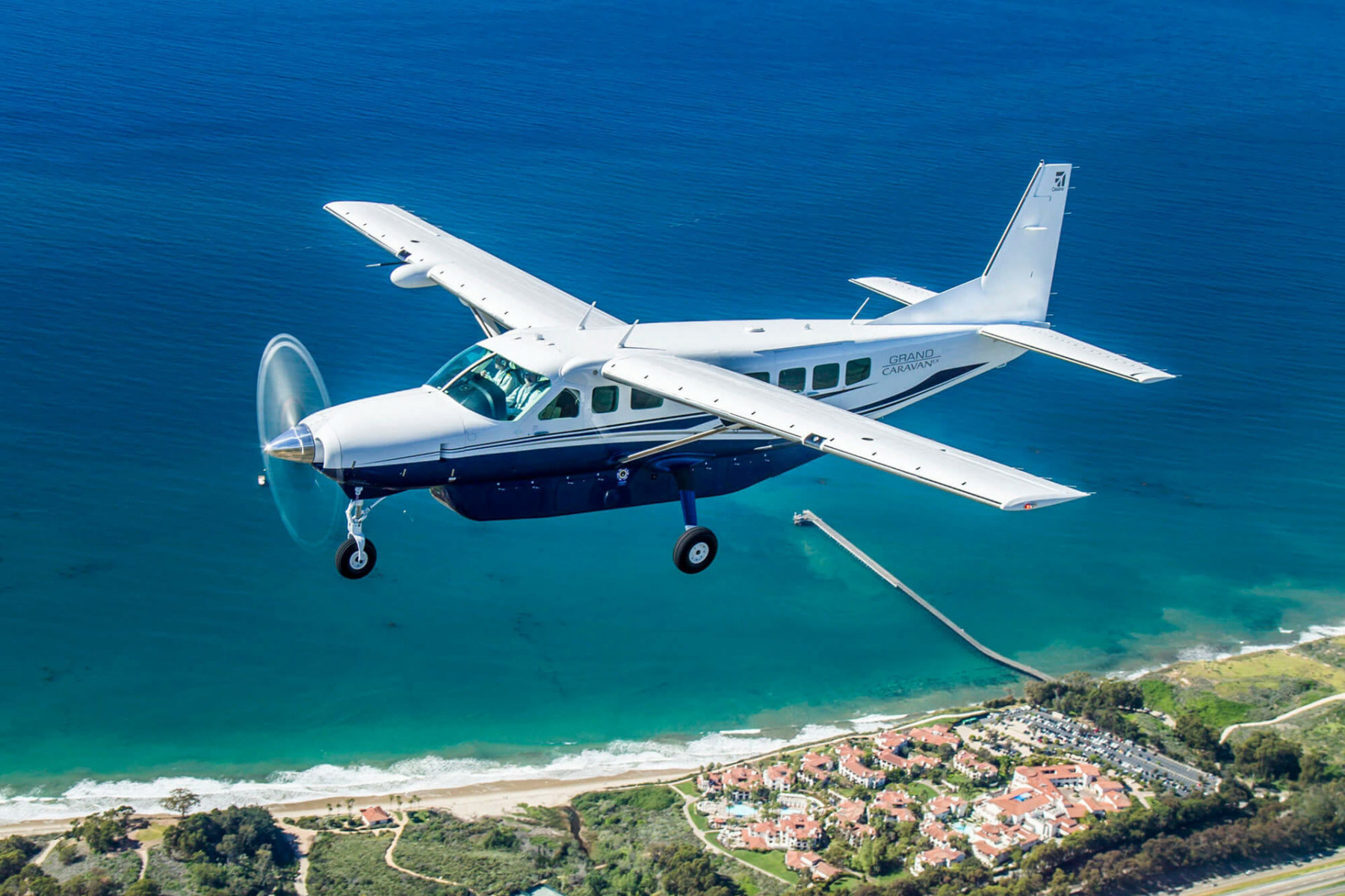 Cessna Grand Caravan flying beach