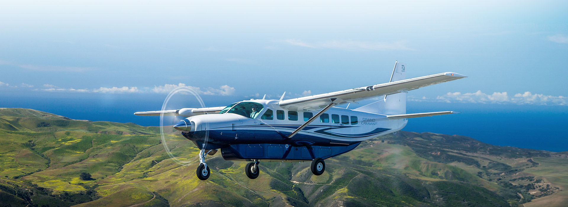 Cessna Grand Caravan flying mountain