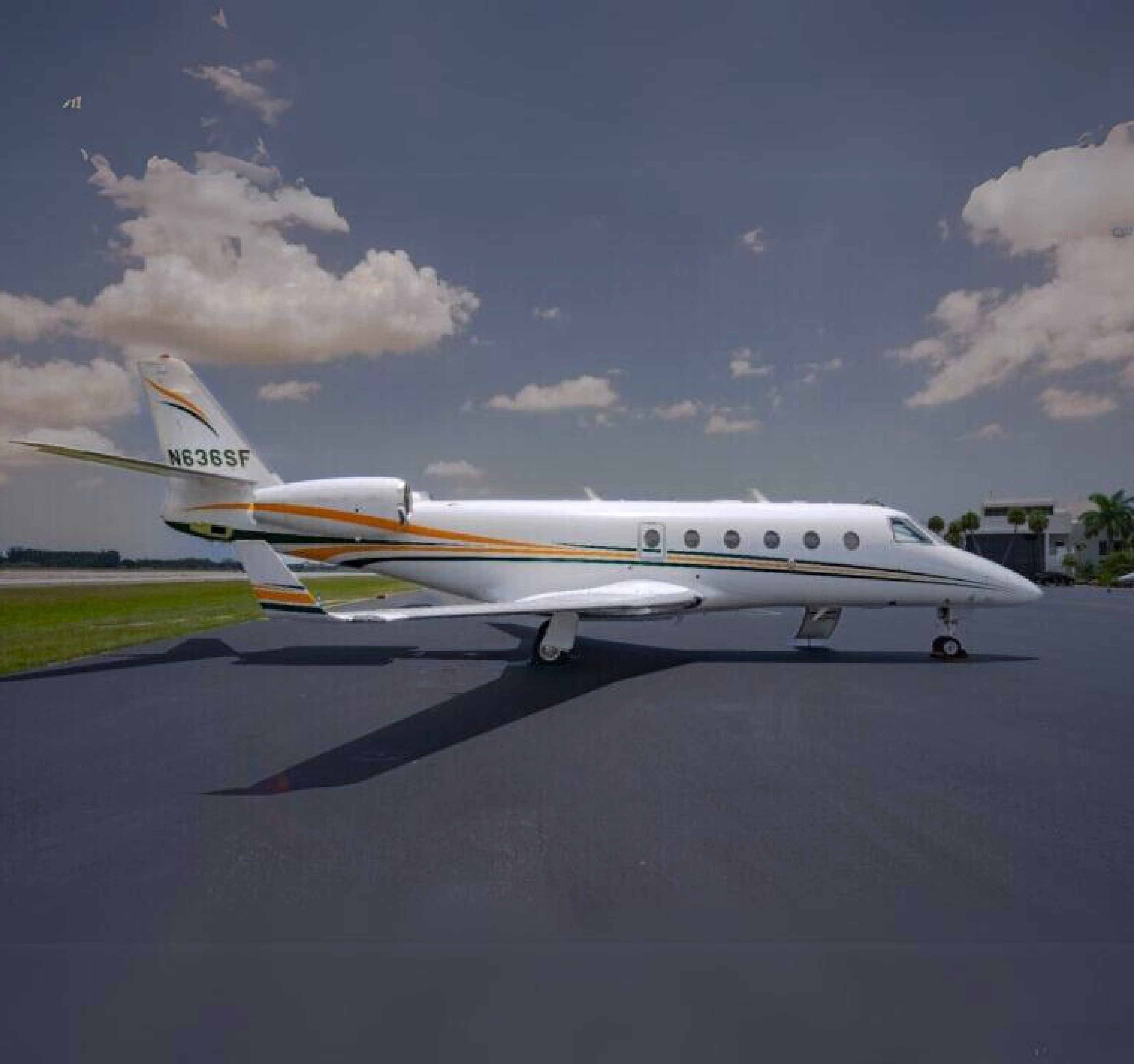 A Gulfstream G150 private jet on a runway for Noble Air Charter Miami